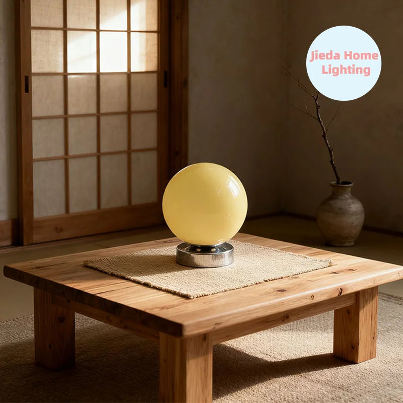 Walnut wood lamp with glass globe